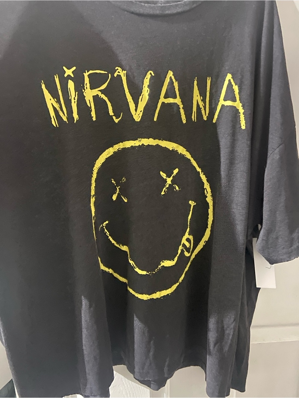 NIRVANA Black Tee with yellow Smiley Logo